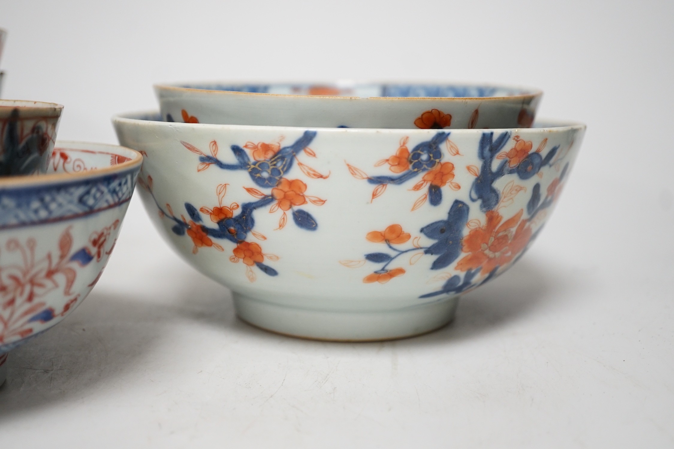 Six 18th century Chinese porcelain bowls (a.f.) and a Chinese imari plate, largest bowl 20cm diameter